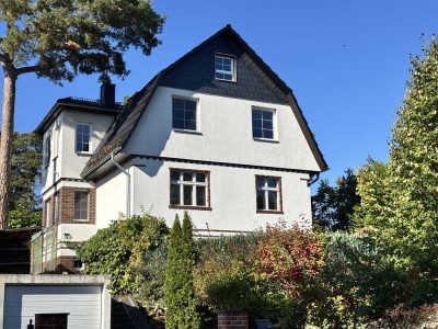 Einfamilienhaus mit großem Garten & Einliegerwohnung in attraktiver Hanglage