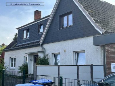 DHH mit Gewerbeeinheit und Einliegerwohnung in Travemünde