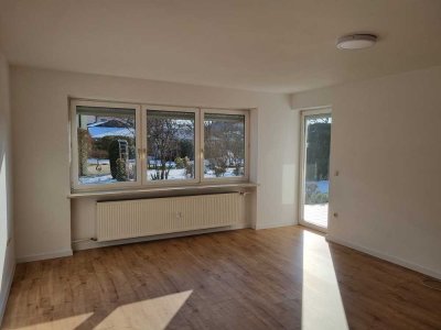 4-Zimmer Erdgeschosswohnung im Zweifamilienhaus mit großer Südterrasse und Garten