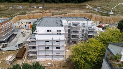 2-Zimmer-Wohnung mit Dachterrasse und Parkplatz – Wohnen im Grünen mit Top-Anbindung