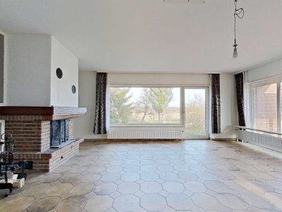 Weitläufige 3-Zimmer-Erdgeschosswohnung mit 2 Terrassen, GARTEN, EBK und Kamin in naturnaher Umge...