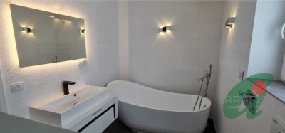 Exklusive 3-Zimmer Erdgeschosswohnung mit Garten und Sauna