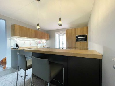 Zentrale Maisonette mit hochwertiger Küchenausstattung & Garten