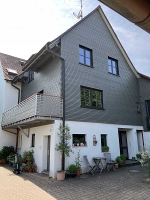 Exklusive 3,5-Zimmer-Wohnung mit gehobener Innenausstattung mit Balkon und Einbauküche in Immenstaad
