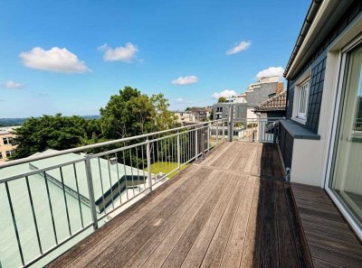 Einzigartiges Mehrfamilienhaus mit einem großzügigem Loft und Garagen mitten im Stadtzentrum.
