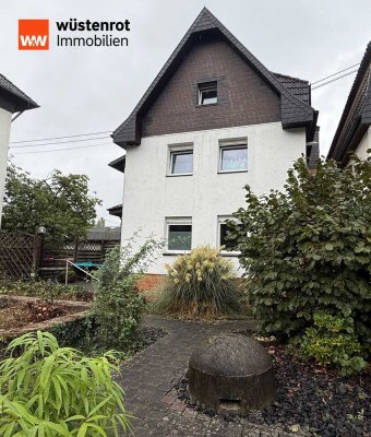 Ein Zweifamilienhaus zum Wohlfühlen, mit großem Garten und Garage in Unkel