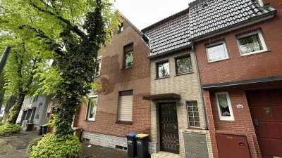 **Heimwerker-Chance! Individuelles Reihenhaus mit großem Garten in Essen-Dellwig**