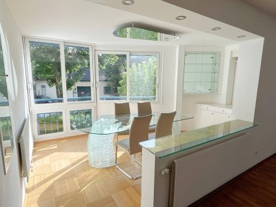 Stadtleben im Grünen – Stilvolle Wohnung mit Terrasse und Garten