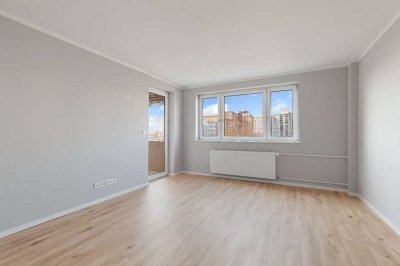 Umfassend sanierte 2-Zimmer Wohnung mit maßgefertigter Einbauküche!