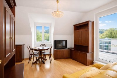Wohnen mit Ausblick: Komfortable 2-Zimmer-Wohnung mit großer Terrasse &amp; Tiefgaragenplatz
