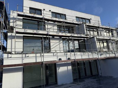 Ihr neues Zuhause mit Garten – moderne 4-Zimmer-Wohnung im Effizienzhaus 40