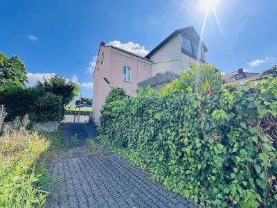 Seltene Gelegenheit in Bonn-Beuel Limperich: Großzügiges Bestandshaus mit bebaubarem Gru