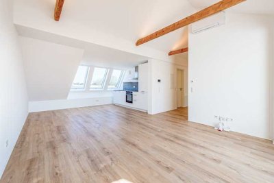 Neubau Erstbezug! Hochwertige 2-Zi.-Dachgeschosswohnung in Top Citylage von Neu-Isenburg!