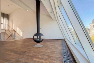 Leben in der Innenstadt: Gepflegtes Reihenmittelhaus samt Dachterrasse und TG-Stellplatz