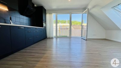 3 Zimmer Dachgeschosswohnung - sonnige Terrasse - gute Anbindung - Parkplatz