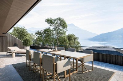 Bühne frei für See, Sonne und Berge!Terrassenwohnung in Steinbach am Attersee mit privatem Seezugang