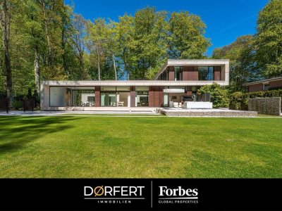 Architektonisches Statement im Grünen und preisgekrönte Villa - „Haus am Park"