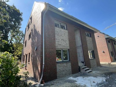 Attraktiv und günstig! Neubau EG-Wohnung mit Terrasse! WBS erforderlich!