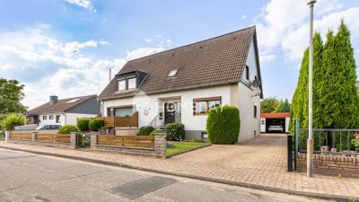 Wohnkomfort auf ganzer Linie: Zweifamilienhaus mit großem Garten, Vollkeller und Garage