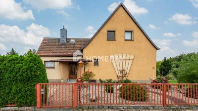 Charmantes Einfamilienhaus mit gepflegtem Garten, Garage und Terrasse in familienfreundlicher Lage