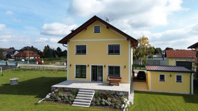 NEUES NIEDRIGENERGIEHAUS MIT GROSSEM GRUNDSTÜCK