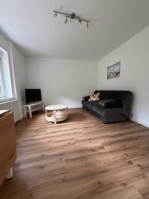 Sofort einziehen & wohlfühlen – stilvoll sanierte 1,5-Zimmer-Wohnung mit grünem Innenhof