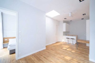 Traumhafte 2-Zimmer-Wohnung mit eigener Terrasse in ruhiger Hinterhoflage