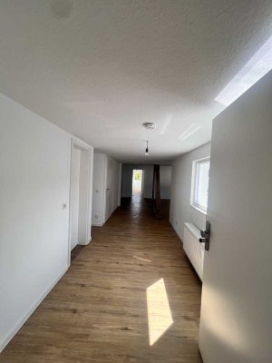 Erstbezug: Stilvolle Dachgeschosswohnung in repräsentativem Gewerbeobjekt im Herzen von Worms