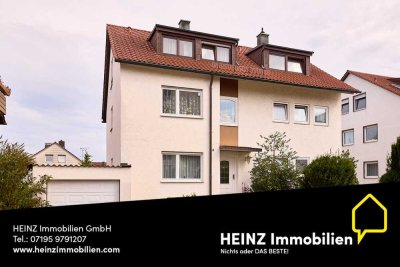 Charmantes Zweifamilienhaus mit Dachausbau und großem Garten auf 521qm Grundstücksfläche
