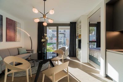 Möblierte Design-Wohnung mit eigener Terrasse & Garten - Neubau 2022