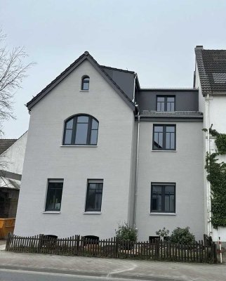 Moderne 4-Zimmer-Wohnung mit nachhaltigem Energiekonzept und Gartenanteil - ERSTBEZUG