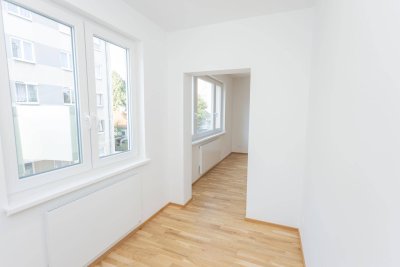 ERSTBEZUG NACH KOMPLETTSANIERUNG!! Entzückende 2 Zimmer Eigentumswohnung mit Loggia in Donaunähe - inkl. KFZ Stellplatz
