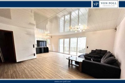 Großzügige Souterrain-Wohnung mit Terrasse und  Garten in idyllischer Lage