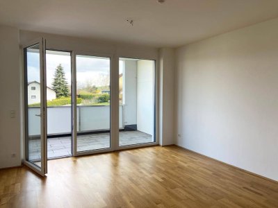 Wohnen mit Aussicht: Moderne Mietwohnung mit Balkon, Küche &amp; gratis TG-Platz – Top 04