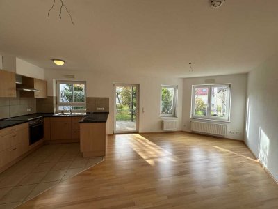 Charmante 3-Zimmer-Wohnung mit Südterrasse, Gartenanteil & hochwertiger Schreinerküche