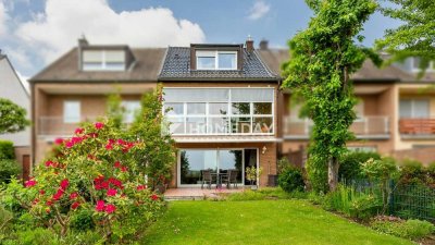 Großzügiges Reihenmittelhaus mit Einliegerwohnung, Wintergarten und Blick ins Grüne in Köln-Zündorf
