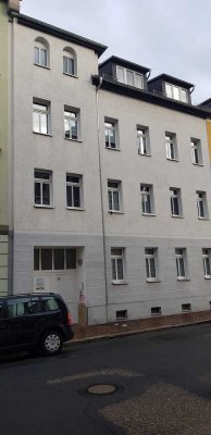 Dachgeschosswohnung mit Balkon und Einbauküche