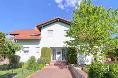MG - Bann: 2 Häuser, ein Preis! Voll vermietets Doppelhaus mit Garagen und Garten