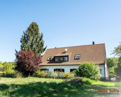 Vielseitiges Anwesen: Mehrfamilienhaus auf großem Grundstück mit Platz für Neubau!