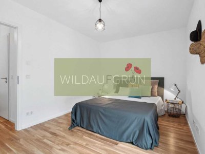 Wohnen im Grünen: Neubauwohnung mit Terrasse