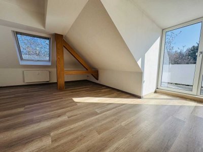 Stilvolle 3-Zimmer-Dachgeschosswohnung mit Balkon