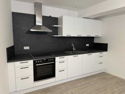 3-Zimmer Erdgeschosswohnung mit moderner Ausstattung, Einbauküche und einem Freisitz
