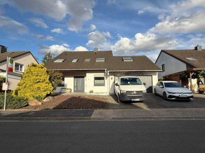Geräumiges Einfamilienhaus mit 7 Zimmern und Garage in Lage
