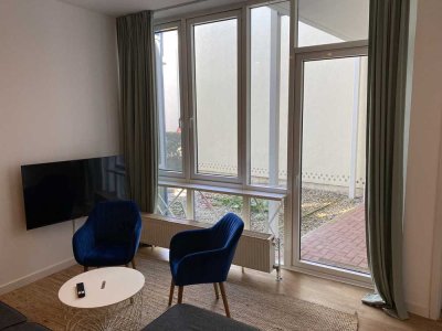 Voll möblierte 2-Raum-Wohnung mit hochwertiger Ausstattung, EBK & Terrasse im Herzen von Warnemünde