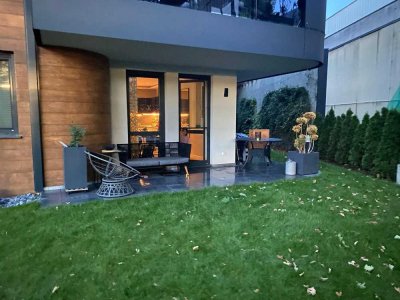Neubauwohnung mit Einbauküche und Garten