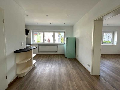 Hochparterre-Wohnung mit Einbauküche und Stellplatz