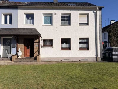 Erdgeschoss-Wohnung mit großem Garten, Garage & ausgebautem Keller