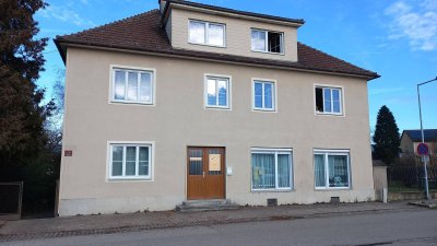 Geräumiges Mehrfamilienhaus mit Garten und Geschäftslokal neben Bahnhof Pöchlarn