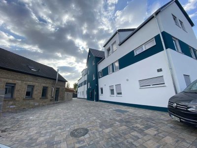 105 qm 1.OG Wohnung Neubau,  Armsheim ab 01.05.2026 Aufzug und Tiefgarage, großer Balkon