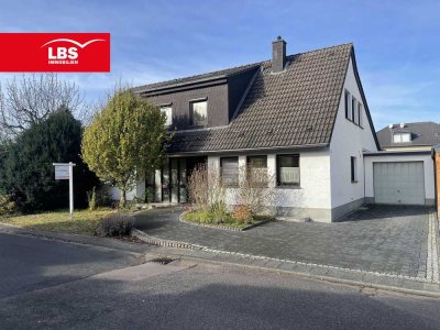 Außergewöhnliches ZFH mit Garage und idyllischem Garten in ruhiger Lage